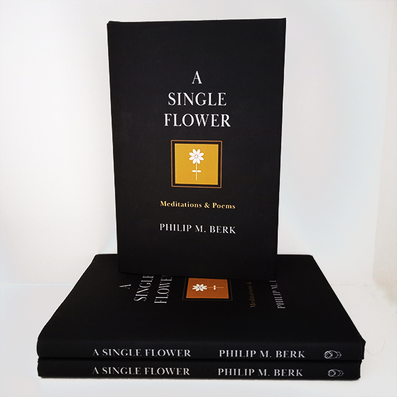 A Single Flower books stacked on bookshelf